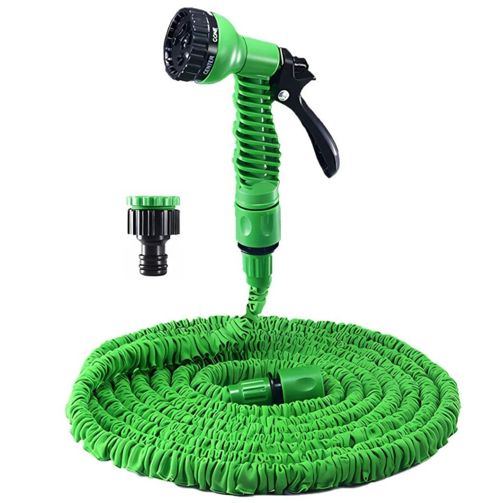 Expandable hose pipe coiled with nozzle attached